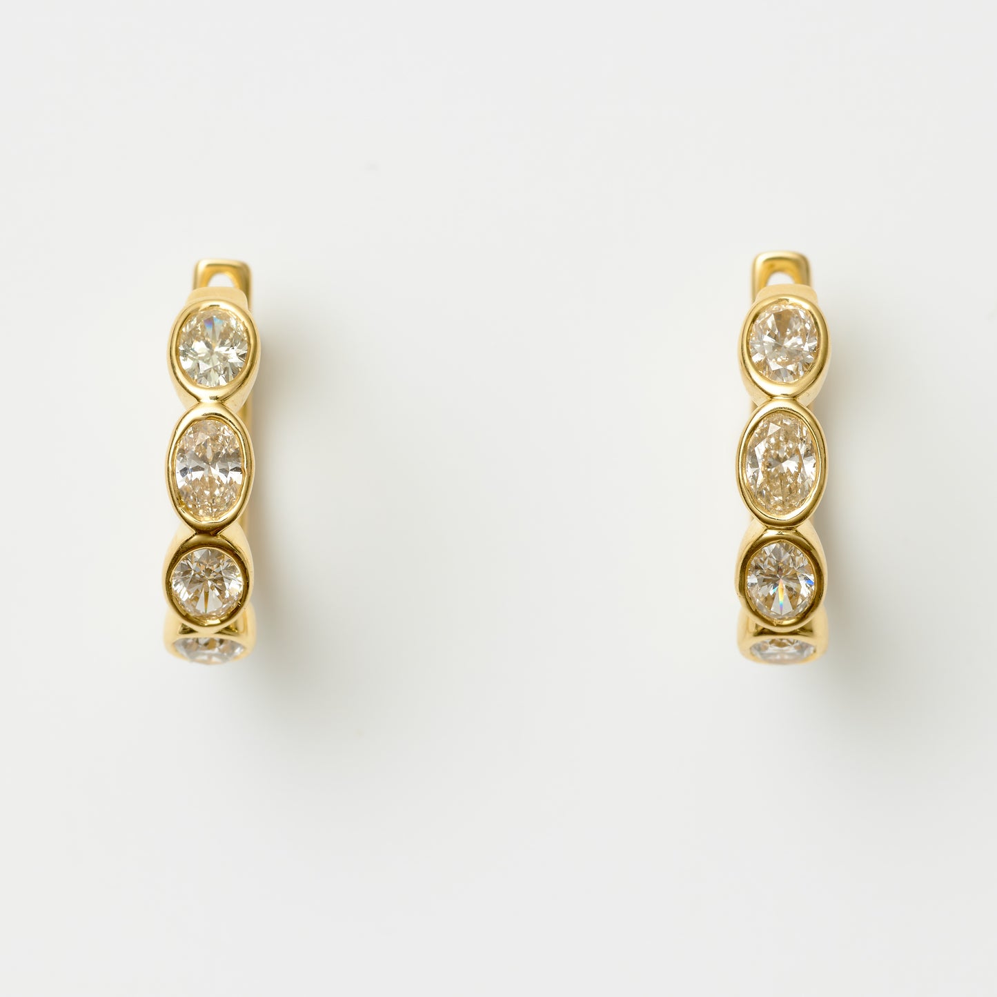Bezel-Set Oval Diamond Hoops