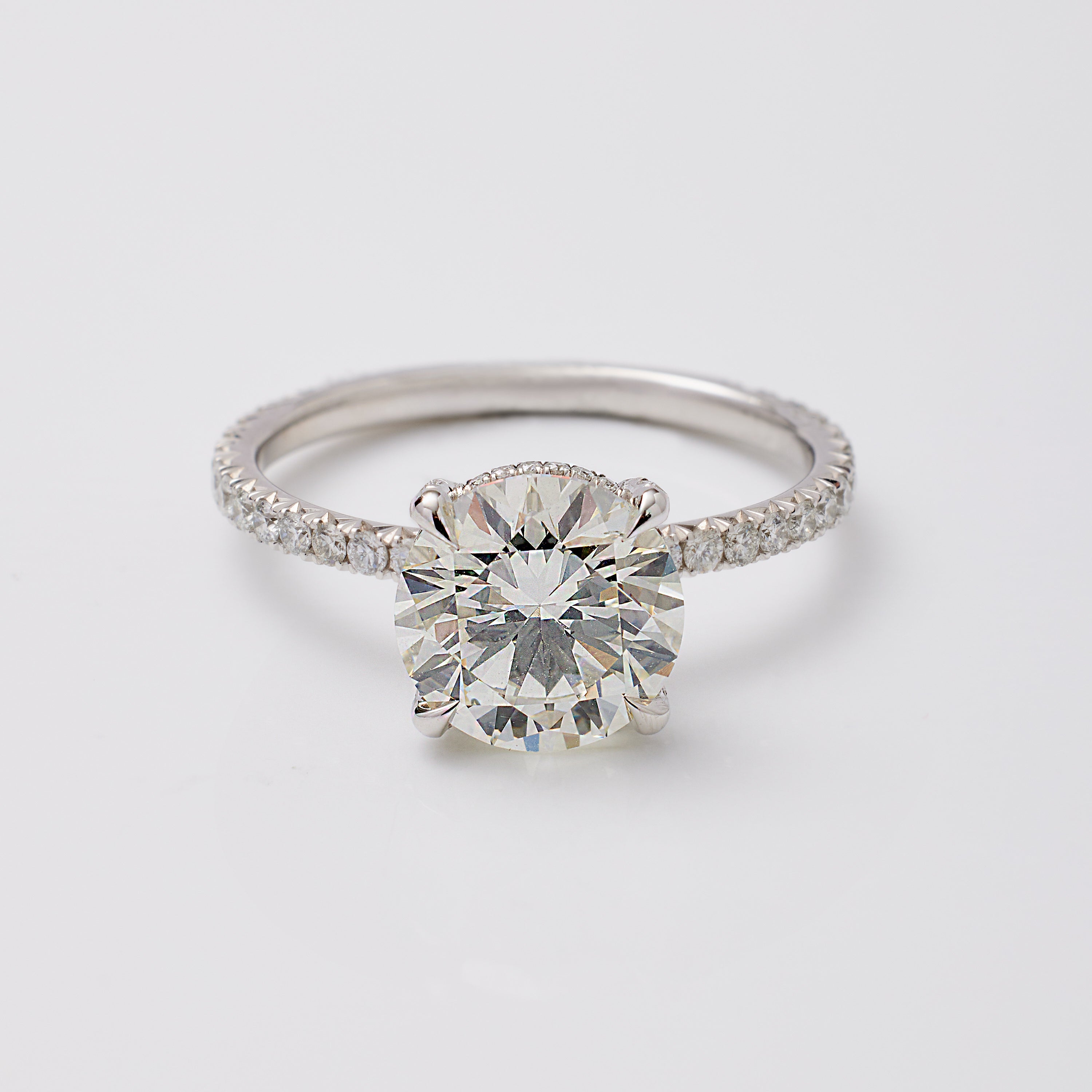 Round-Brilliant Signature Solitaire Ring